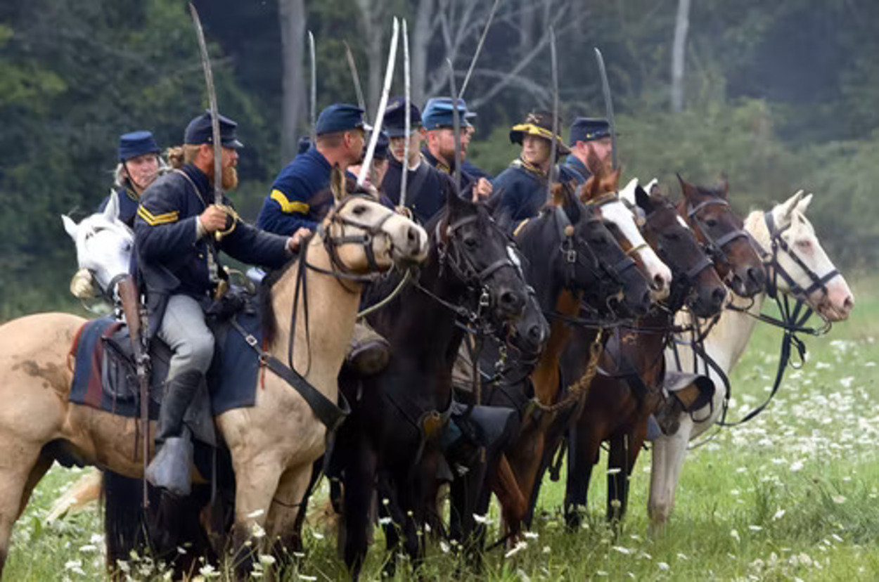 soldados a caballo